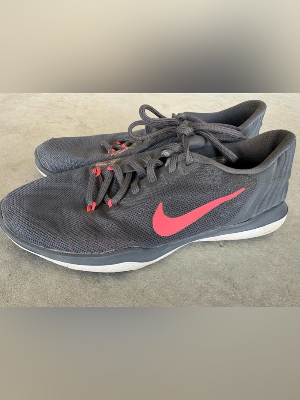 Nike Women’s Black Athletic Sneakers with Pink-Red Swoosh
